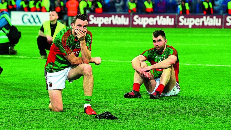 &nbsp;Mayos keith higgins and seamus o shea dejected after the final whistle in Croke Park. Picture by Seamus Loughran.