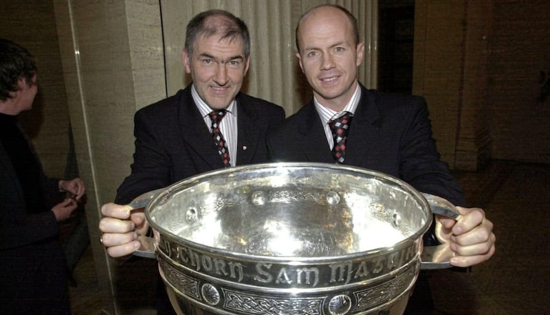 Tyrone GAA football manager Mickey Harte (left) and former captain Peter Canavan 