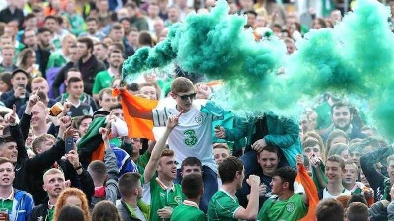 Both Northern Ireland and Republic of Ireland fans are scrambling for tickets and travel for their side&#39;s last 16 matches in the European Championships in France. Pictured are Republic of Ireland fans at the fanzone in Belfast 