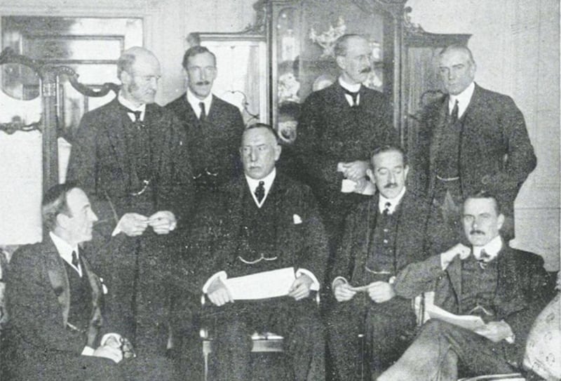 Clockwise from above left, Ulster Unionist leader James Craig, centre, and members of his cabinet in London in November 1921 