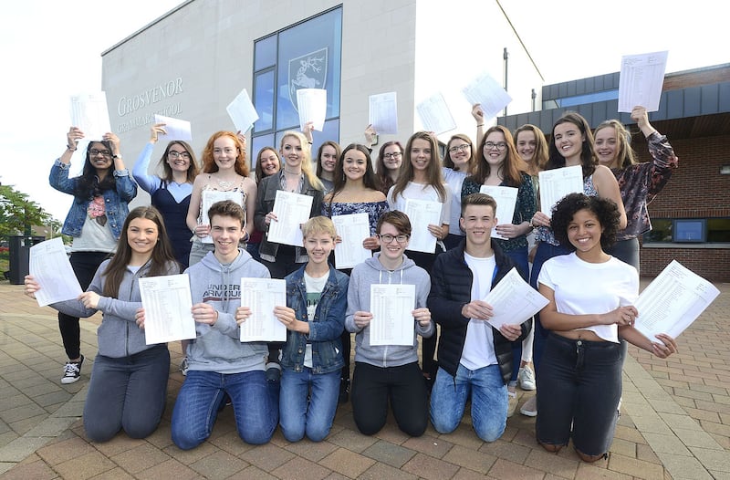 Pupils from Grosvenor Grammar School in Belfast, Northern Ireland pictured after  receiving their GCSE results..Picture By Pacemaker.