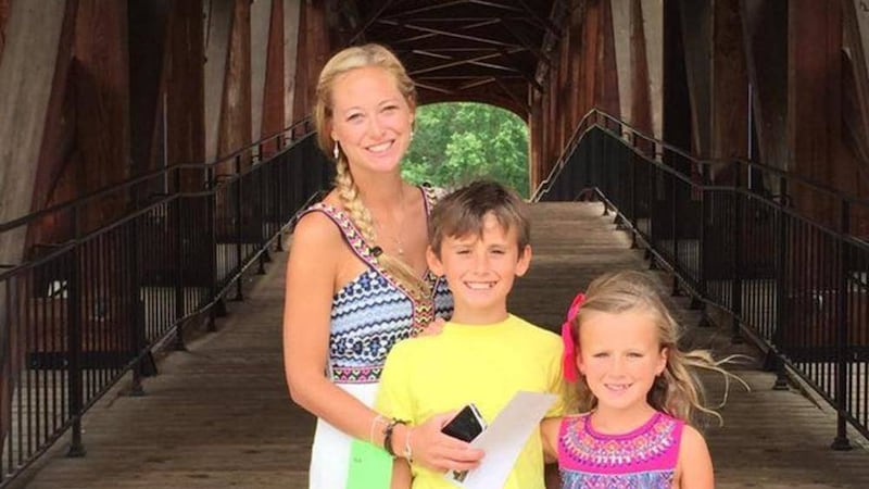 Molly Martens in a Facebook picture with stepchildren Jack and Sarah Corbett in July 