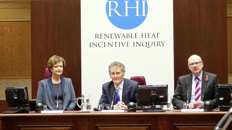 Retired appeal court judge Sir Patrick Coghlin, centre, at the Renewable Heat Incentive (RHI) inquiry. Picture by Mal McCann 