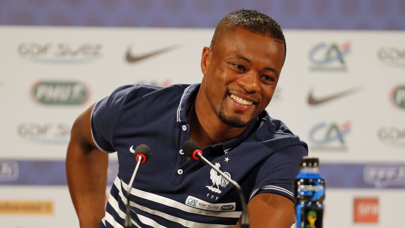 France captain Patrice Evra was benched by coach Raymond Domenech after a changing room rebellion
