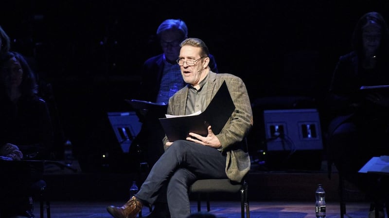 Ciar&aacute;n Hinds performs on stage at the Milton Court Concert Hall in London 