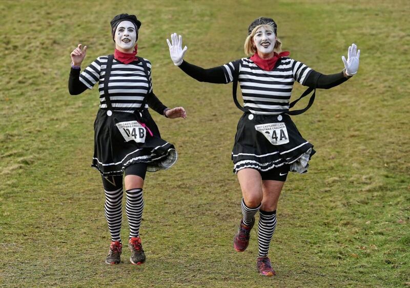Runners dressed as Mimes take part in the annual Christmas Cracker Pairs race in Castlewellan organised by the Newcastle AC. Picture Mal McCann.
