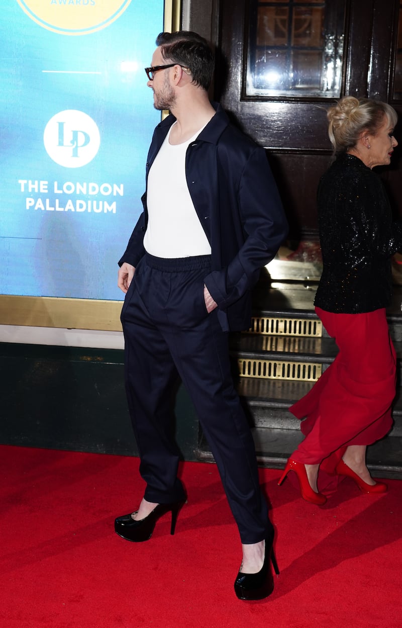 Kevin Clifton wearing high heels