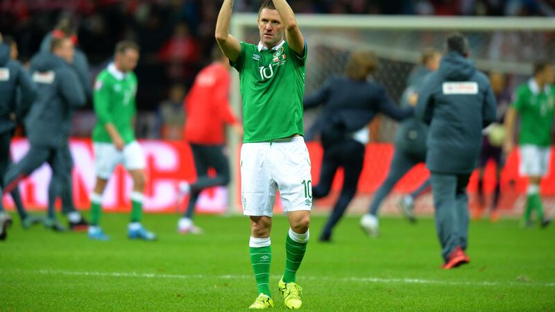 Robbie Keane salutes the travelling support after Ireland's defeat in Warsaw last Sunday night consigned them to the play-offs for Euro 2016<br />Picture: PA&nbsp;