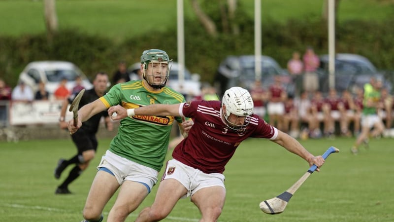Dunloy&#39;s Paul Shiels tackles Cushendall&#39;s Martin Burke during last night&#39;s game. Picture by Brendan McTaggart 