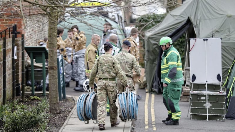 Military and emergency services personnel outside Bourne Hill police station in Salisbury, as police and members of the armed forces probe the suspected nerve agent attack on Russian double agent Sergei Skripal PICTURE: Andrew Matthews/PA 