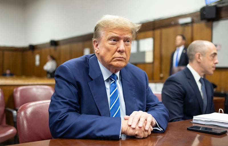 Donald Trump awaits the start of proceedings on the second day of jury selection at Manhattan Criminal Court in New York (Justin Lane/Pool Photo via AP)