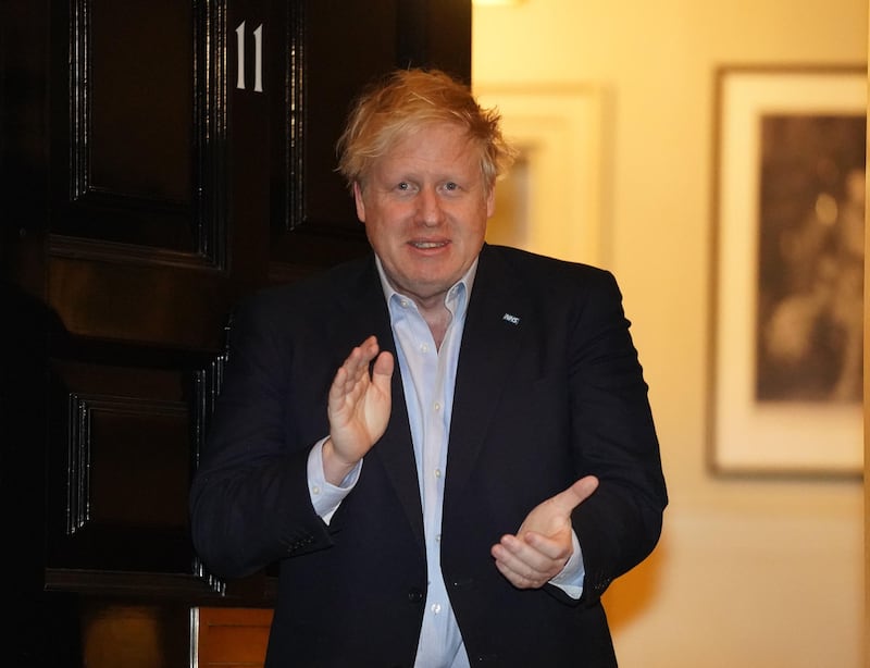Boris Johnson clapping outside 11 Downing Street in London to salute local heroes during last Thursday's Clap for Carers NHS initiative to applaud workers fighting the coronavirus pandemic