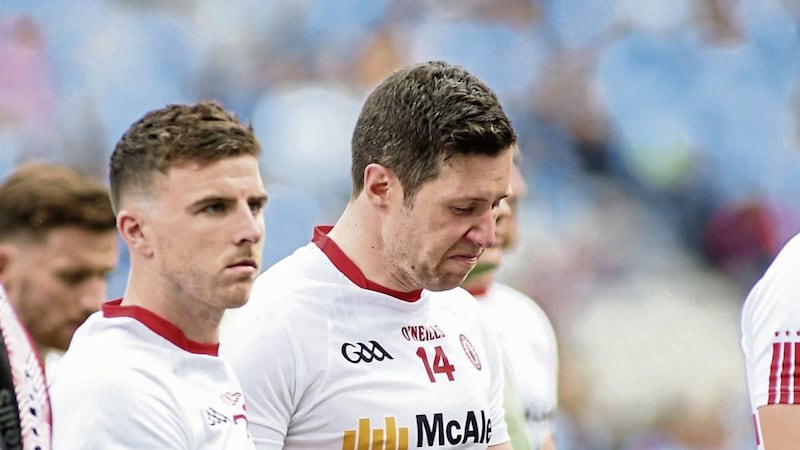A dejected Sean Cavanagh walks off the pitch for the last time in a Tyrone jersey after the All-Ireland semi-final defeat to Dublin Picture by Hugh Russell 