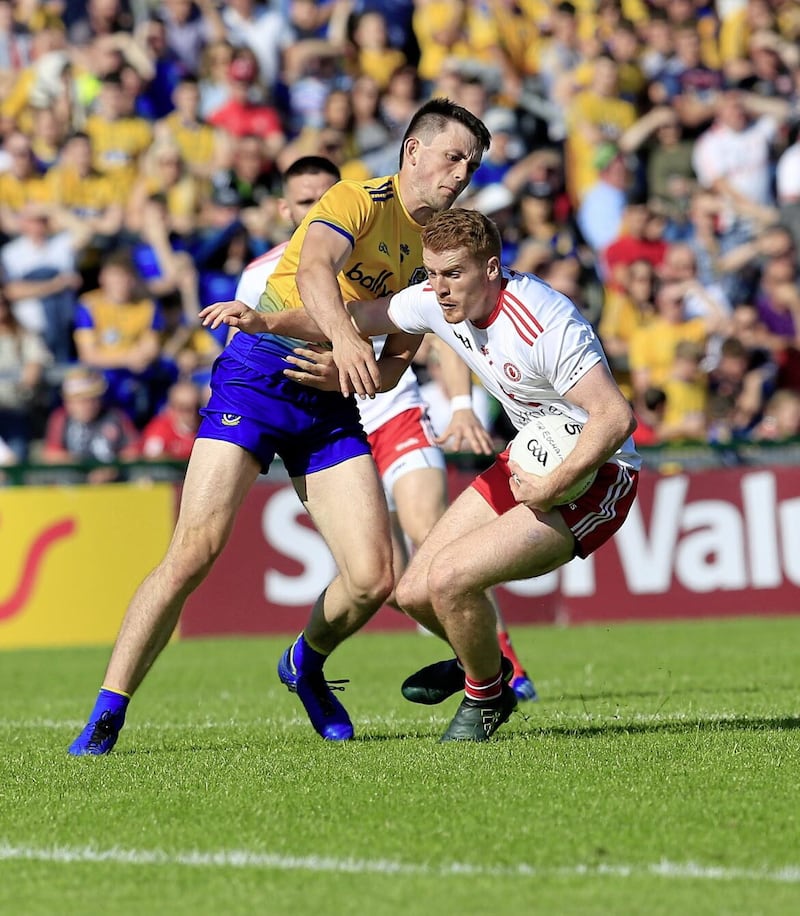 Tyrone&#39;s Peter Harte and Roscommon&#39;s Brian Stack in action during the GAA Football All-Ireland Senior Championship Quarter-Final Group 2 Phase 1 between Tyrone and Roscommon at Dr Hyde Park in Roscommon on Sunday July 13 2019 Picture by Philip Walsh. 