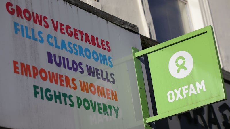 An Oxfam shop sign in London (Yui Mok/PA)