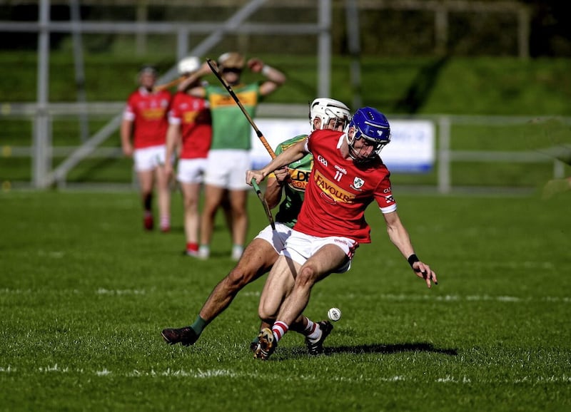 Loughgiel&#39;s James McNaughton holds off Dunloy&#39;s Seaan Elliott during Sunday&#39;s semi-final in Ballycastle Picture: Seamus Loughran 