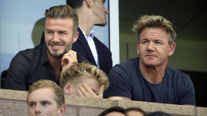 Beckham at a soccer match in California at the weekend with chef Gordon Ramsay 