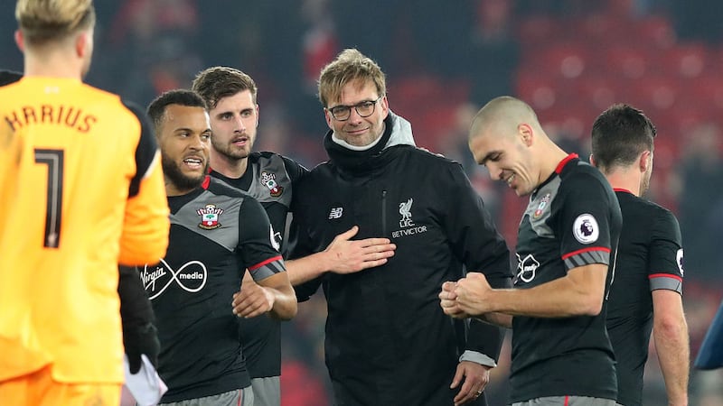 Liverpool manager Jurgen Klopp (centre) congratulates the Southampton players after the EFL Cup semi-final, second leg match at Anfield on Wednesday January 25, 2017. 