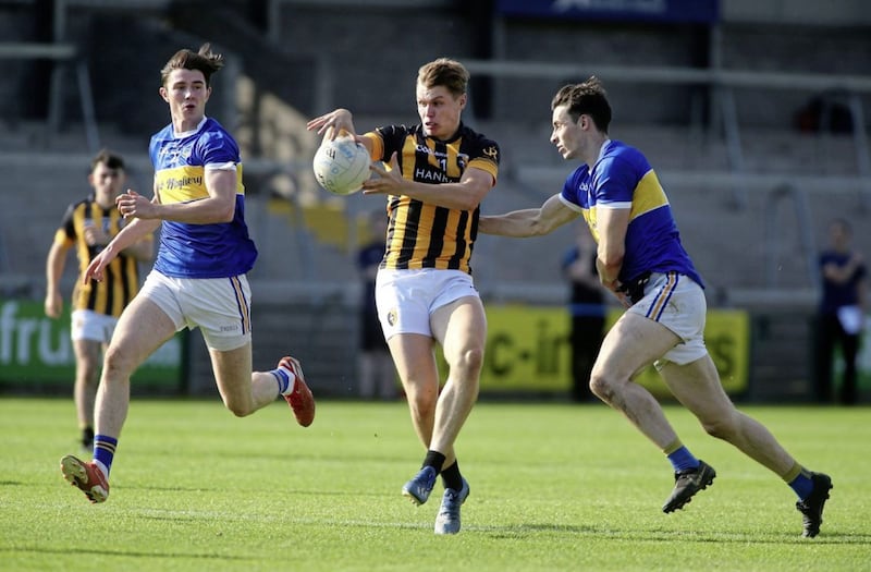 Crossmaglen&#39;s Oisin O Neill races past Maghery&#39;s Ben Crealey and Ciaran Higgins, in the 2020 Armagh Football Final at the Athletic Grounds. Oisin and his younger brother, Rian, look like they will also be stars for the county for years to come. Picture by Seamus Loughran. 