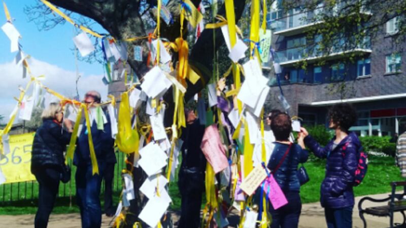 Supporters are tying ribbons to trees and sharing their ideas of freedom.