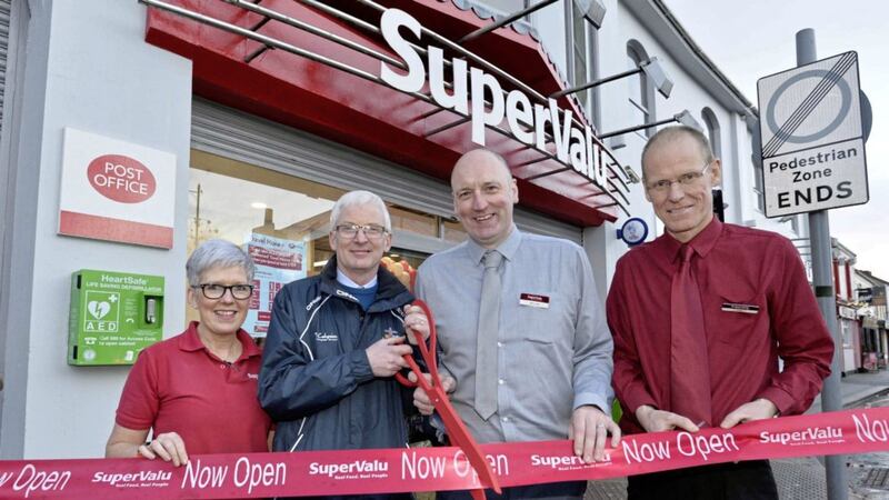 Limavady store manager, Declan Lane is joined by SuperValu SuperStar, Leo McCloskey, to officially open the new-look store. 