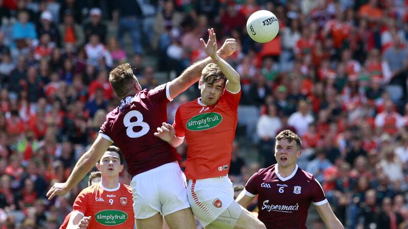 Galway's Paul Conroy gets up above Andy Murnin of Armagh during the All-Ireland SFC quarter-final at Croke Park<br />Picture: Philip Walsh