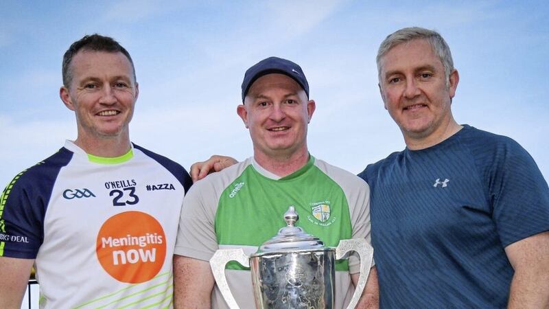The Cargin management team of (l-r) Ronan Devlin, Kevin Doyle and Damian Cassidy pictured after the club&#39;s historic three-in-a-row Antrim SFC success in 2020. Devlin has stepped into the manager&#39;s role this year 