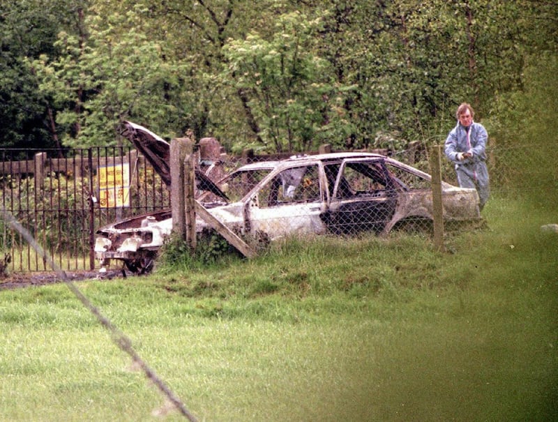 Burnt out car at the scene where Sean Brown's body was found