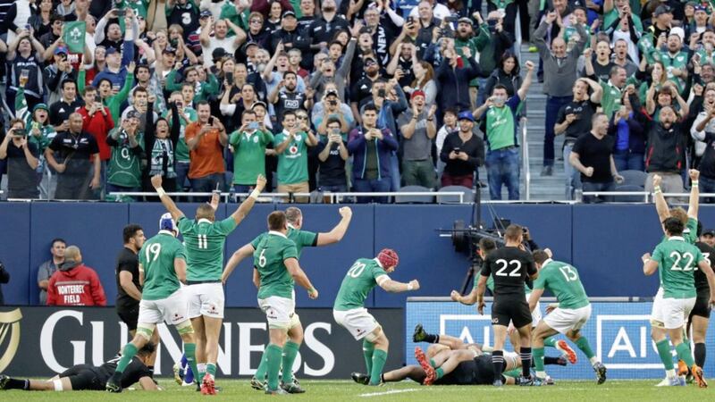 Ireland's players celebrate after scoring against New Zealand in Chicago