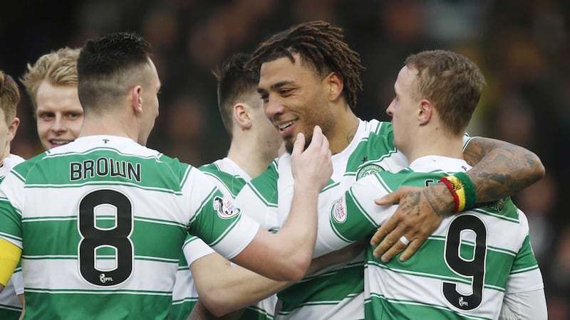 Celtic new boy Colin Kazim-Richards is congratulated after opening his account for the Hoops against East Kilbride on Saturday