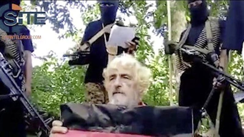 An image made from militant video shows German hostage Jurgen Gustav Kantner at an undisclosed location. Picture by SITE Intel Group via Associated Press 