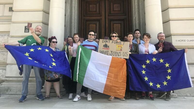People gather at a rally dubbed #WeAreIrishToo outside the Northern Ireland Office on Saturday on Horse Guards Road, Whitehall, London. Picture by Georgina Stubbs, Press Association 