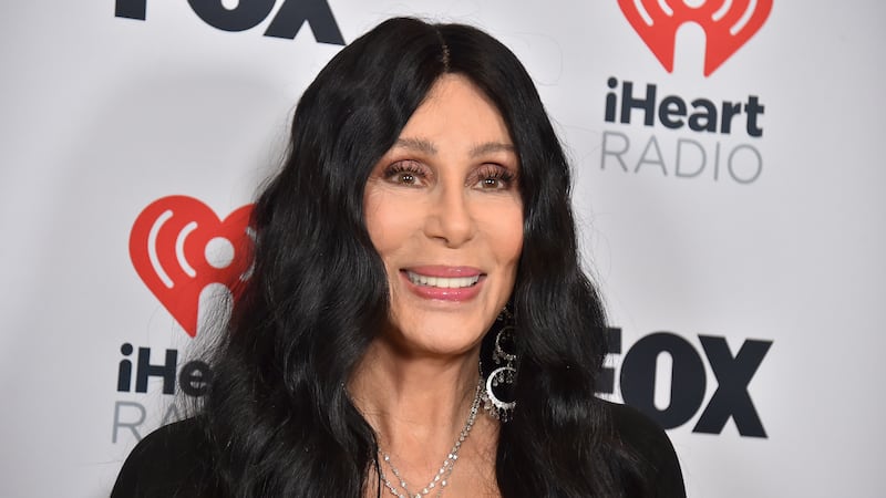Cher poses in the press room at the iHeartRadio Music Awards (Jordan Strauss/Invision/AP)