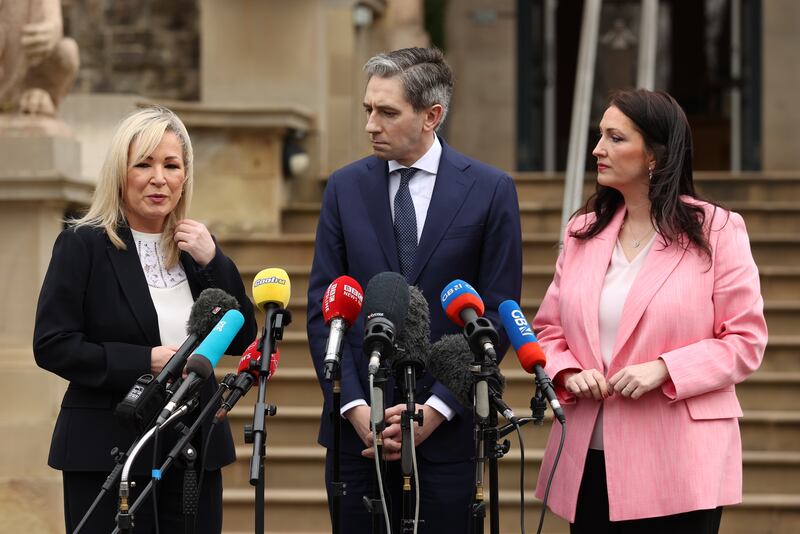 Taoiseach Simon Harris with First Minister Michelle O’Neill and deputy First Minister Emma Little-Pengelly, during a press conference outside Stormont Castle
