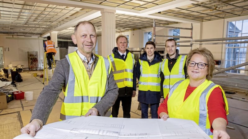 Perusing investment plans for Trocadero Restaurant at the White House are (at front) Ulster Stores owner and managing director Neville Moore with store manager Jayne Booth. At back are Alan Irwin and Scott Caithness (Montgomery Irwin Architects) and Declan McKendry (project contractor at Elmwood Construction) 