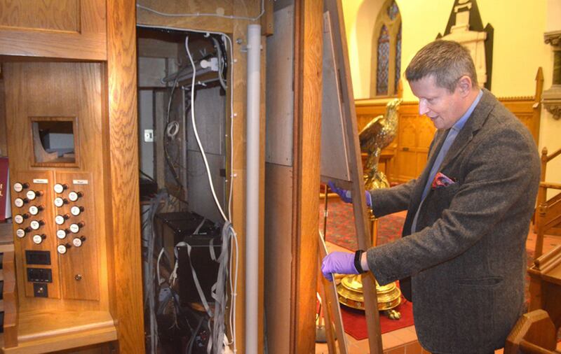 Archdeacon Robert Miller surveys the damage caused during a break-in at Christ Church in Derry&nbsp;