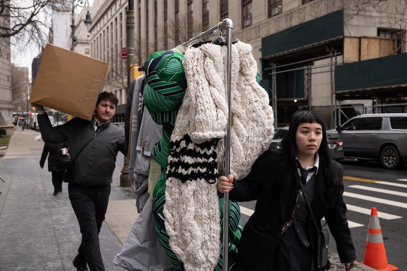 Clothes by fashion designer Thom Browne are taken into Manhattan federal court in New York 