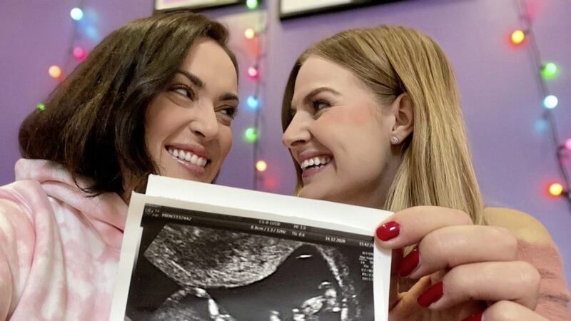YouTubers and podcast hosts Rose and Rosie, with their baby scan 