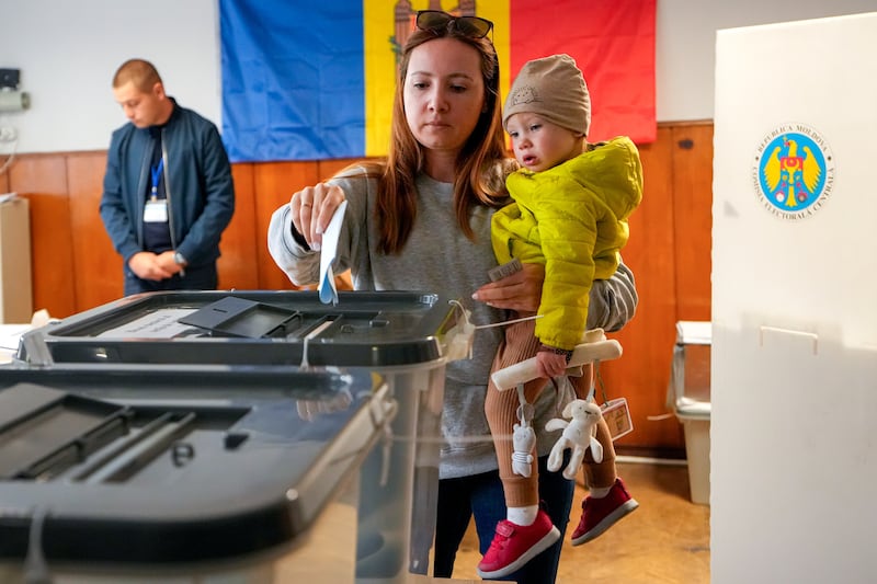 The vote will elect a new 101-seat parliament (Vadim Ghirda/AP)