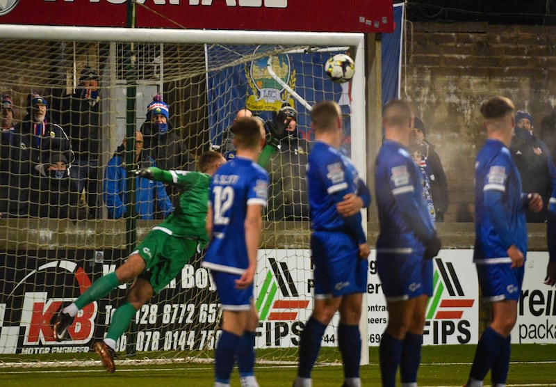PACEMAKER PRESS BELFAST 16-01-24
Bet McLean League Cup - Semi Final
Dungannon Swifts v Linfield 
Kyle McClean of Linfield scores during this Evening's game at Stangmore Park, Dungannon. 
Photo - Andrew McCarroll/ Pacemaker Press