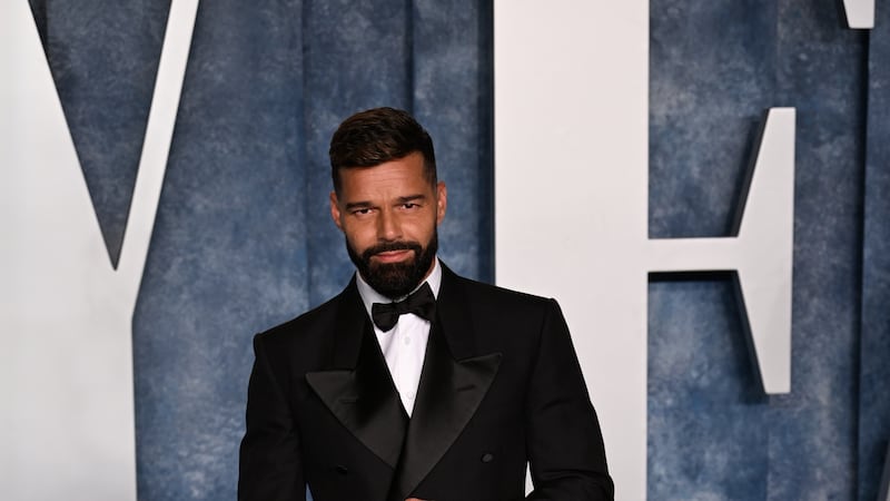 Pop star Ricky Martin says his father encouraged him to come out as gay