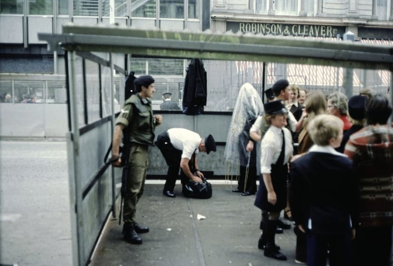 Alastair being searched at the security cordon at Donegall Place. Picture courtesy of Alastair MacLennan Archive 