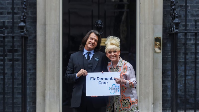 Dame Barbara Windsor and her husband Scott Mitchell deliver an Alzheimer’s Society open letter to 10 Downing Street in Westminster before she died