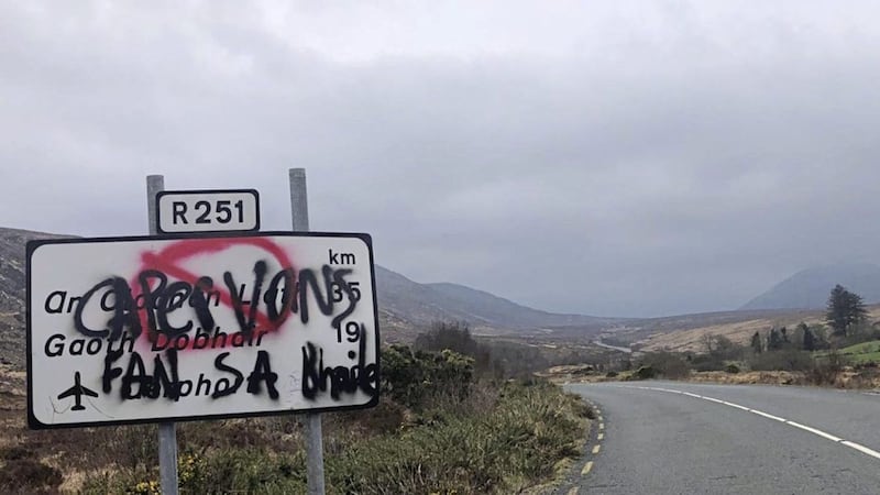 Graffiti written in Irish on Gaeltacht signposts warned campervans to stay at home.  