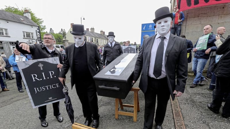 A coffin will be carried from Westminster to Downing Street today by relatives of Troubles victims in protest at British government legacy plans Picture by Hugh Russell. 