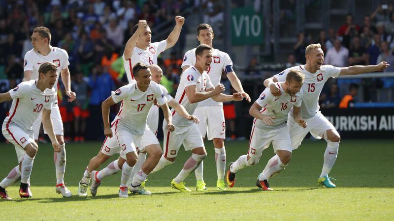 Poland's players celebrate after Poland's Grzegorz Krychowiak scored the decisive penalty, during the Euro 2016 round of 16 soccer match between Switzerland and Poland&nbsp;