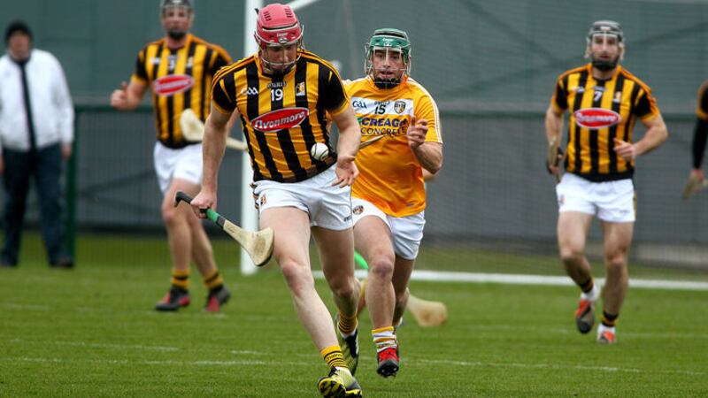 Kilkenny&rsquo;s Robert Lennon gets away from Conor Johnston of Antrim during yesterday&rsquo;s Walsh Cup match in Abbottstown