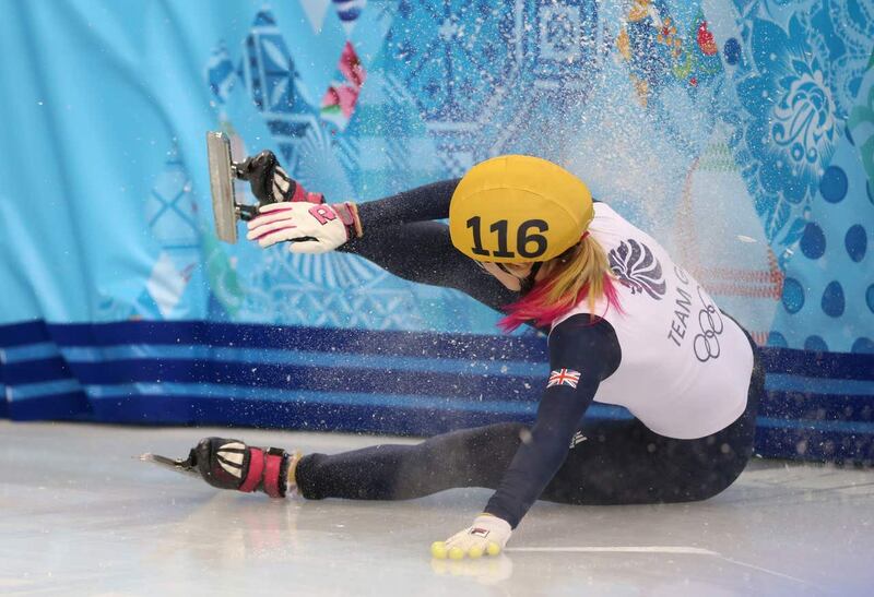 Great Britain’s Elise Christie crashes out of an event at the 2014 Sochi Olympic Games