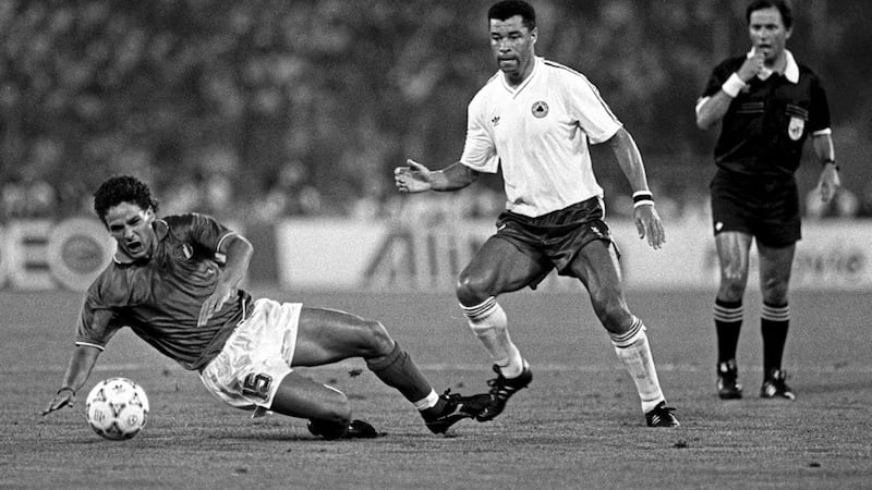 Roberto Baggio with Paul McGrath during their World Cup quarter-final meeting in Rome 30 years ago today 