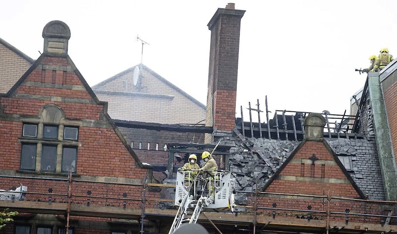 More than 50 firefighters are tackling a blaze at Belfast&#39;s Cathedral Quarter..Crews were called to the Old Cathedral Building, which is home to a range of businesses and groups, at 05:37 BST on Monday.Eight fire engines were dispatched from Belfast, alongside a command unit from Lisburn and two fire aerial appliances. 